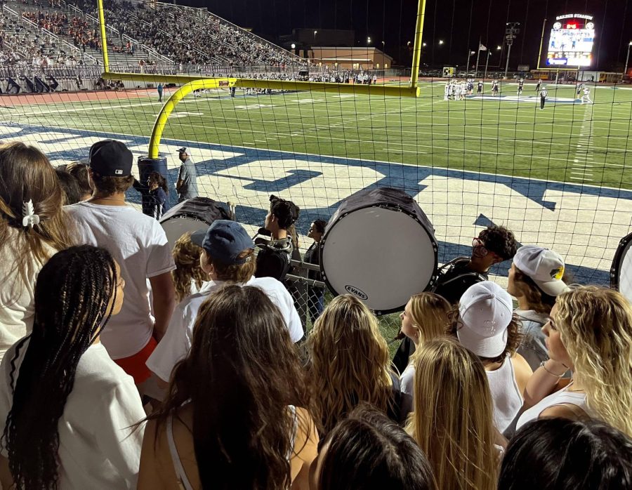 Drumline performs in the student section at Friday nights game against Seguin. 