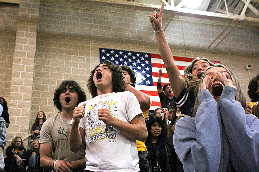 Juniors in the stands compete to win the spirit stick as part of the yell-off competition against the other classes.
