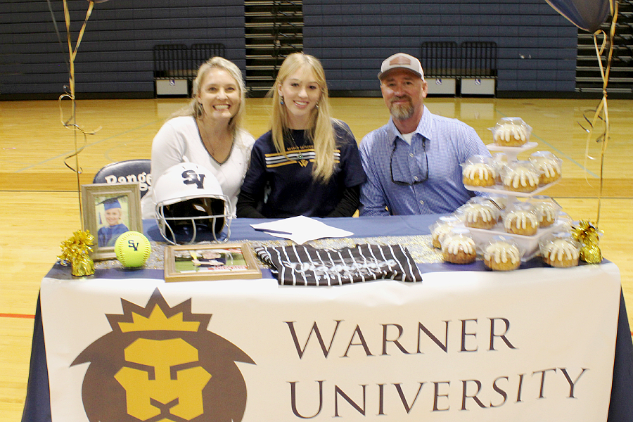 Taylor Nava signed her commitment to play softball at Warner University.