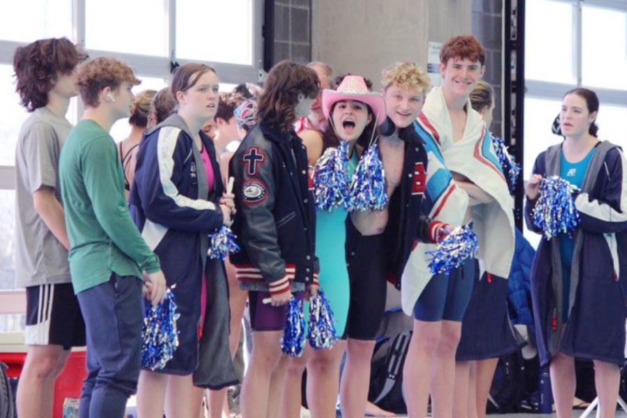 The girls and boys swim teams celebrate their success at the region meet Feb. 3-4 at the Southwest Aquatic Center.