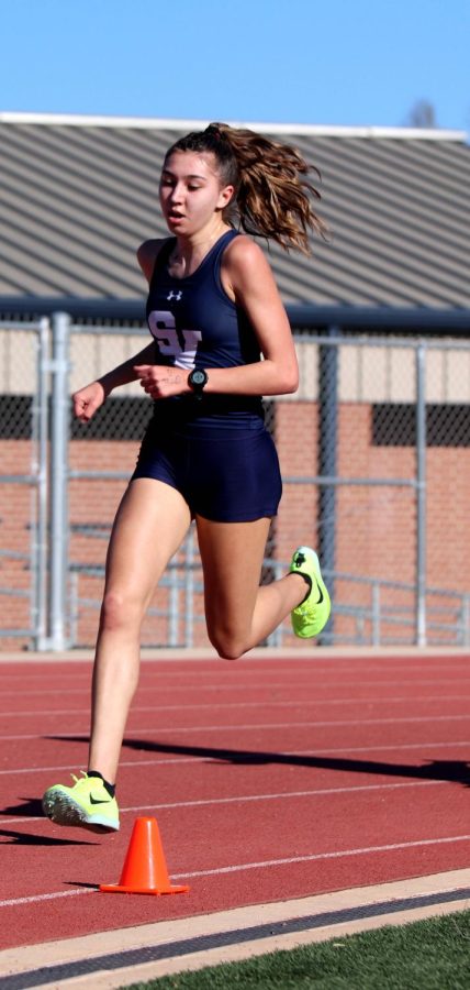 Sophomore Mia Perez competing 1600m run at Ranger Relays.