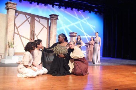 Senior Chaya Powell (center) as Medea in this years one act play Medea. Medea is about a woman, who is divine descent and had the gift of prophecy, that seeks revenge against her unfaithful husband Jason.