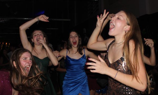 Sophomore Cyanna Cavazos dances with friends at Saturdays Homecoming dance.