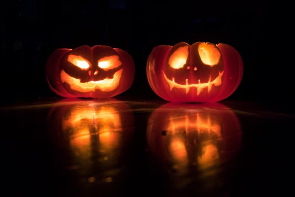 Jack O Lanterns, made from carved out pumpkins, are a Halloween tradition that started in the 19th century. Photo by David Menidrey via unsplash.