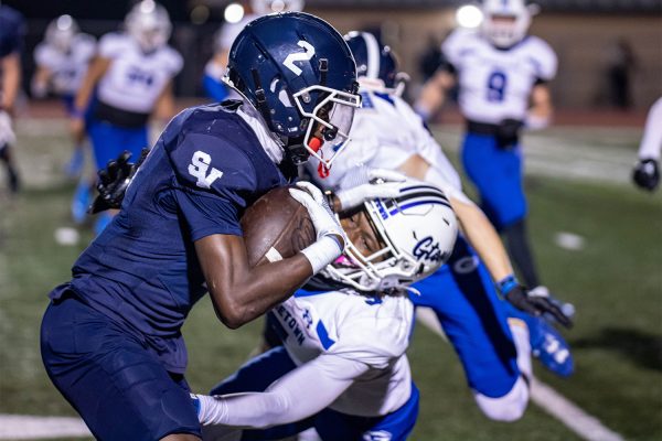 Armed with the ball, senior wide receiver Freddie Dubose puts down a Georgetown defender Nov. 3 at Ranger Stadium. Dubose made six catches for 41 yards in the 41-25 win.