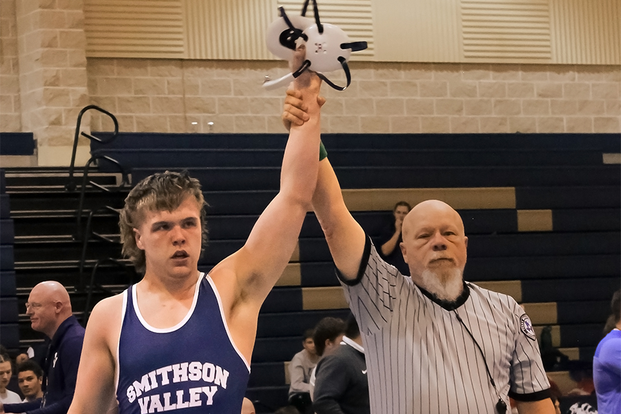 During the Ranger Rumble on Jan. 13, senior Aidan celebrates wrestling win. A week later, Keck and the boys team were runner-up at the Texas High School Wrestling Coaches of America state duels in Wichita Falls.