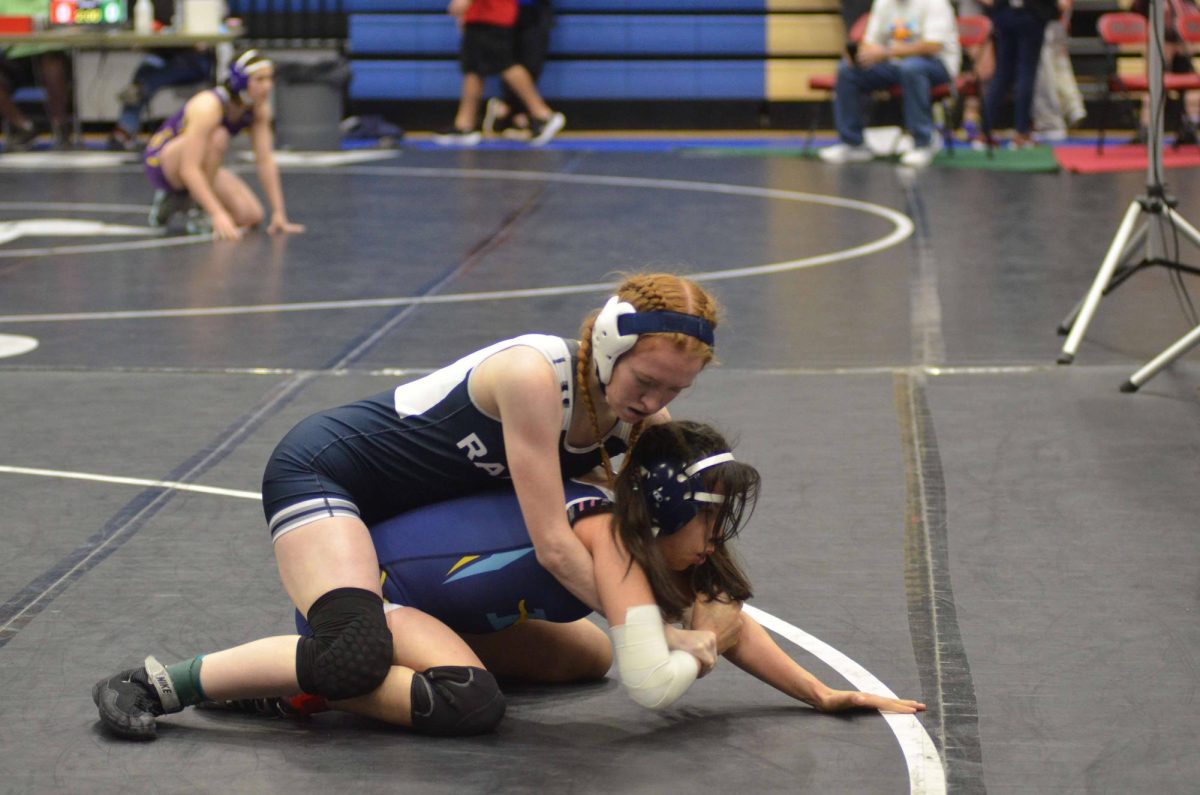 Senior Svala Starcher wrestles at the regional competition. Starcher placed second in the 126 lbs. weight class. Photo courtesy of SV Wrestling.