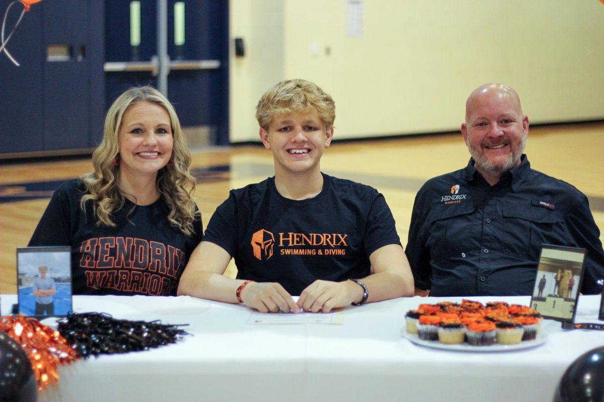 Senior Konner Schnieder signs with Hendrix College to continue his swimming career. Schneider is the district champion in the 200 and 500 freestyle races. 