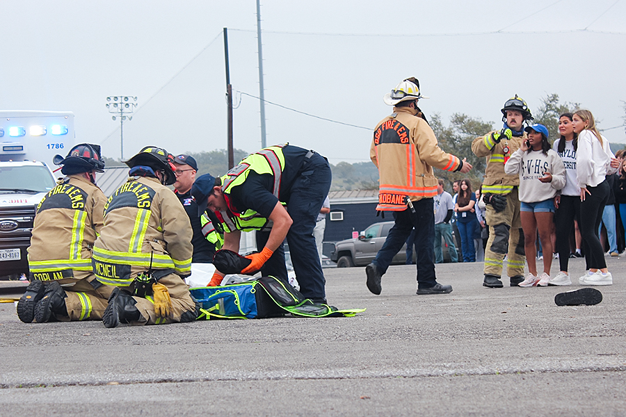 Local firefighters and EMS attempt to revive senior Maverick Minister during the Shattered Dreams presentation March 7. 