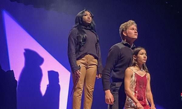 Seniors Victoria Williams and Rowen Hamilton and junior Evie Armour perform the ending scene of the One Act play Iphigenia at the Founders Day celebration April 10.