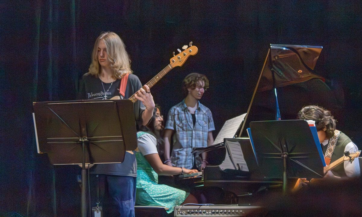 Freshman Jaxon Smith plays the bass with the Jazz band at the Founders Day celebration April 10 during advisory.