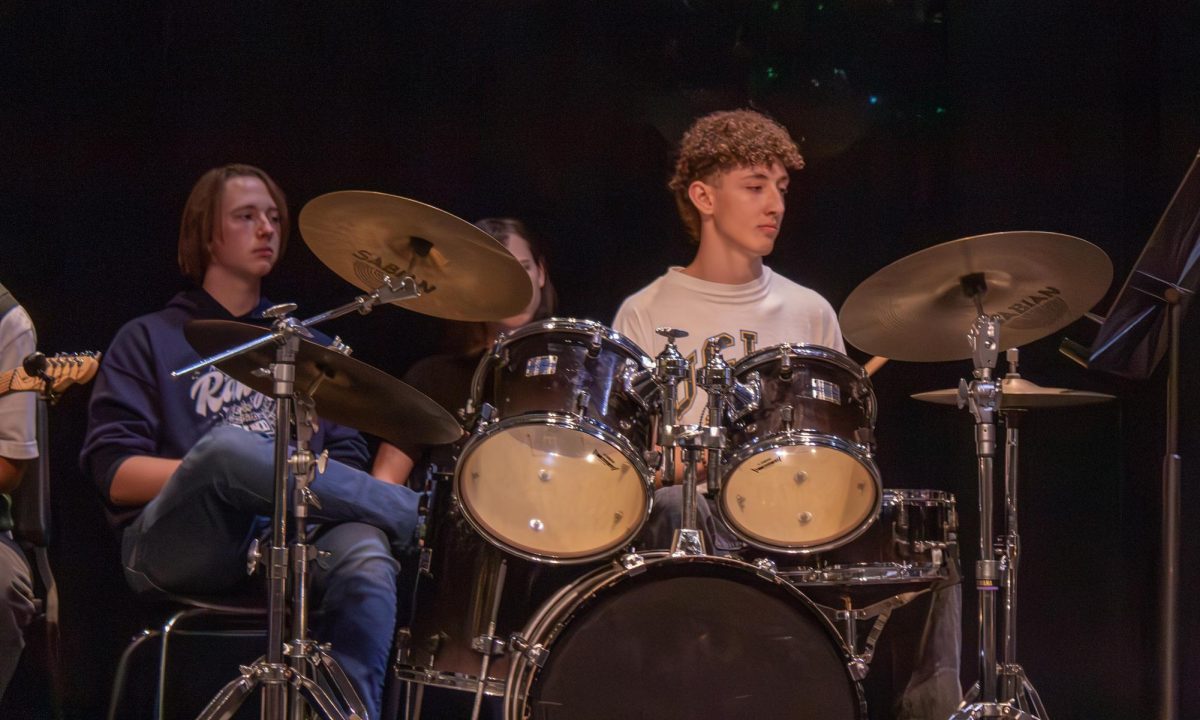 Junior Braeden Wills plays the drums during the Jazz bands performance at the Founders Day celebration April 10.