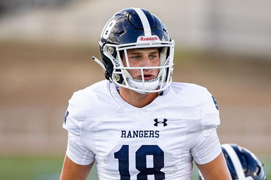 Senior quarterback Cade Spradling gets into position in his first game as a starter in that role Thursday. Spradling not only ran a 39-yard touchdown but also threw a 52-yard touchdown pass.