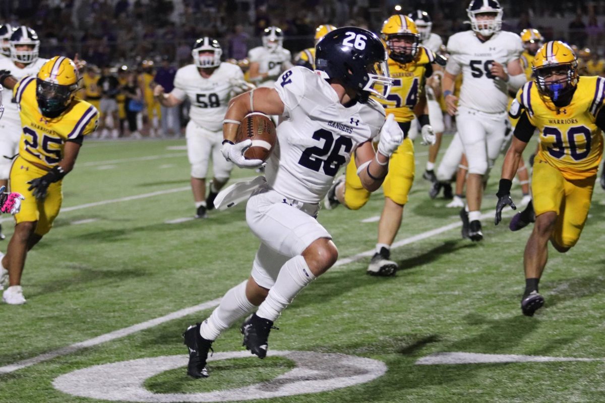 Senior RB Brad Sowersby advances the ball down field during the game against Pieper Friday.