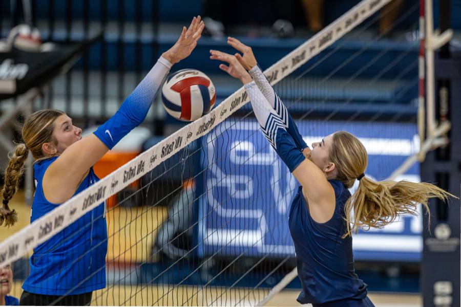 Senior Ava Annunzio blocks the ball against her New Braunfels opponent. 