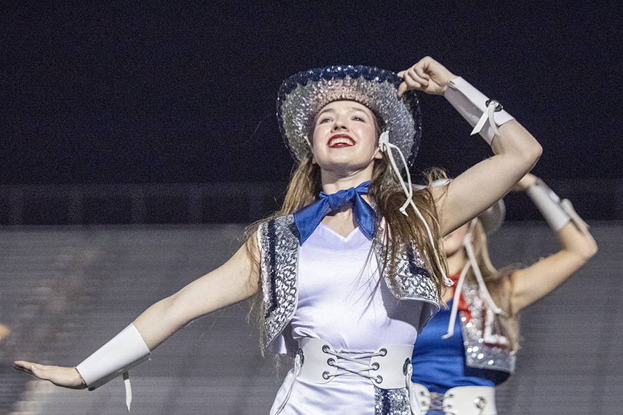 Senior Kylah Moller performs with the varsity dance team during the community pep rally. Moller is the colonel of the team.