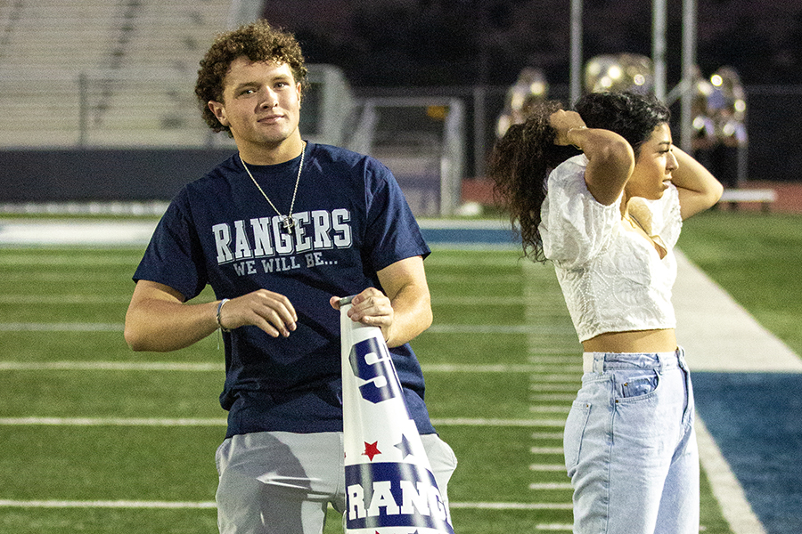 Spirit committee chair Owen Vick and spirit master Allie Almaguer prepare to pump up the crowd during Rally in the Valley.